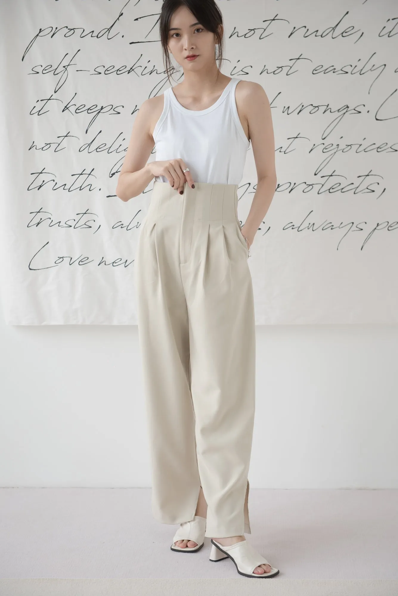 High-waisted wide-legged trousers