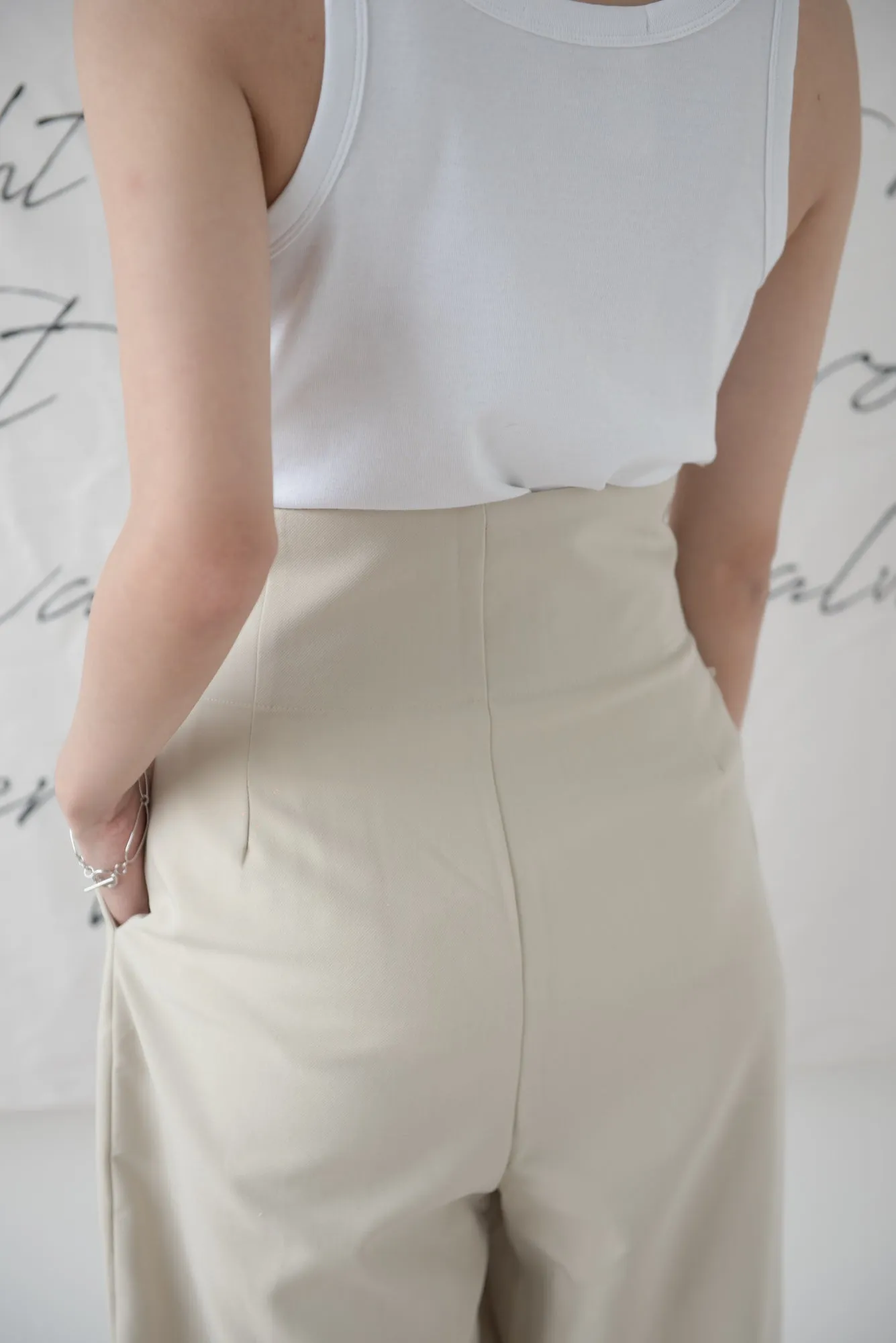 High-waisted wide-legged trousers