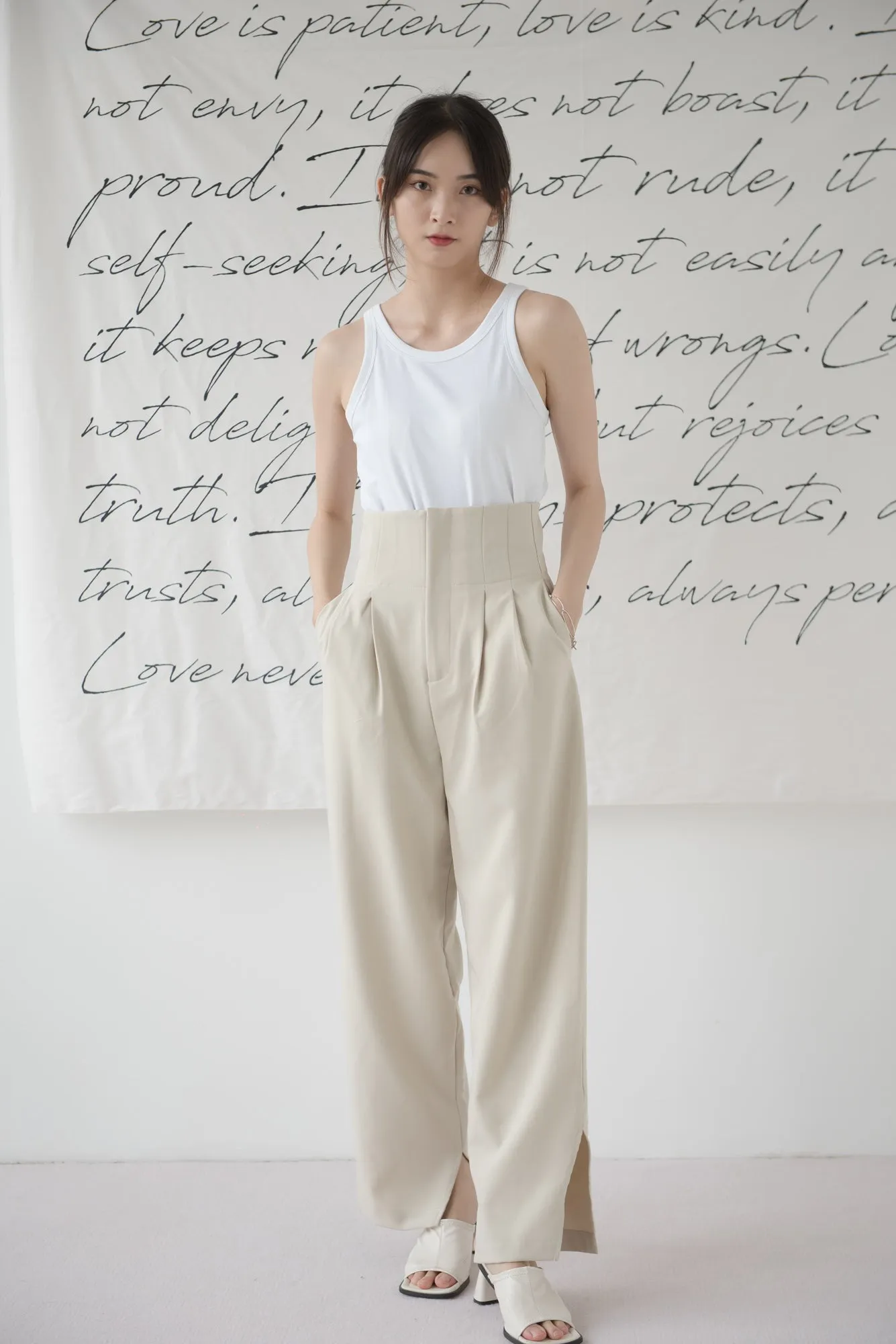 High-waisted wide-legged trousers